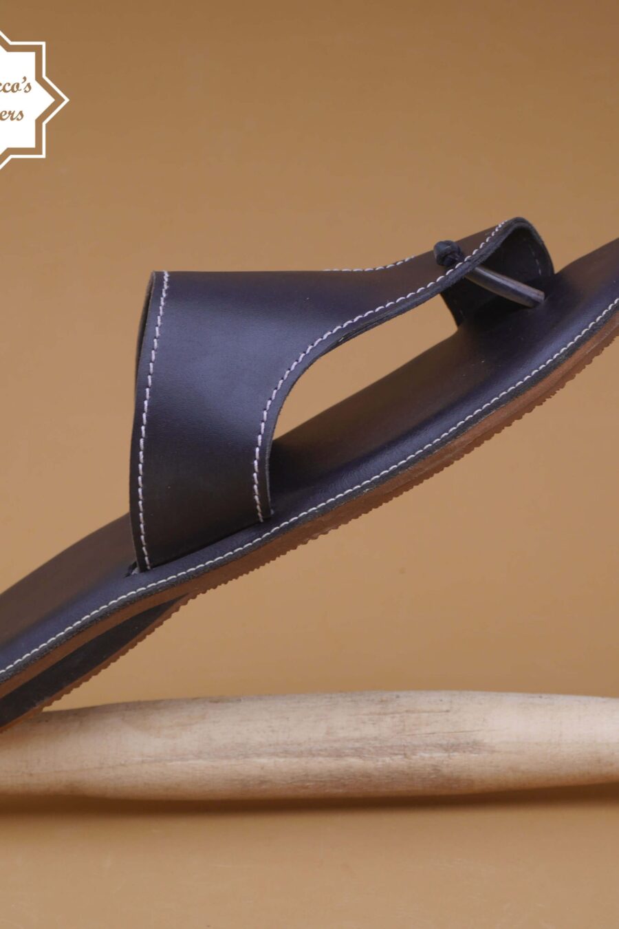 Men's handmade Moroccan black leather sandal with intricate craftsmanship and authentic design