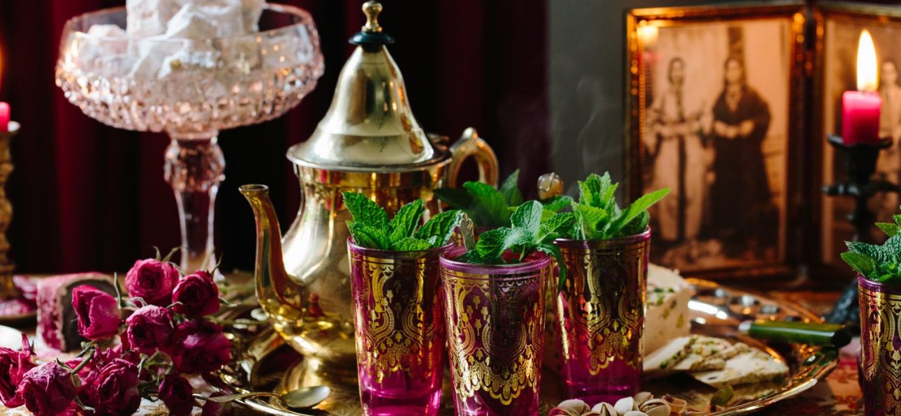 Handcrafted Moroccan Tea Set with Intricate Designs and Vibrant Colors, A Symbol of Moroccan Culture and Hospitality