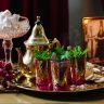 Handcrafted Moroccan Tea Set with Intricate Designs and Vibrant Colors, A Symbol of Moroccan Culture and Hospitality