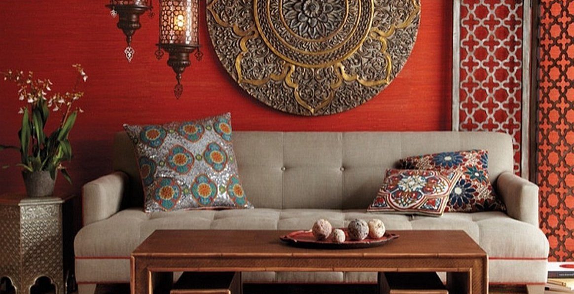 An image showcasing the beauty of Moroccan home decor, including leather pouffs, rugs, lanterns, and more.