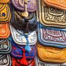 Moroccan leather goods displayed at a bustling market