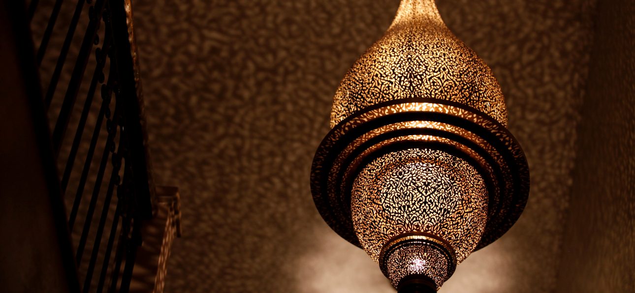 Ornate Moroccan brass lantern with intricate hand-engraved patterns