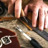 Skilled Moroccan artisans handcrafting leather goods in a traditional workshop