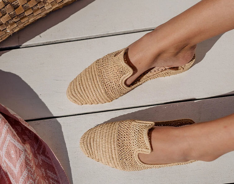 Handcrafted Moroccan Raffia sandal displayed in a stylish interior setting.