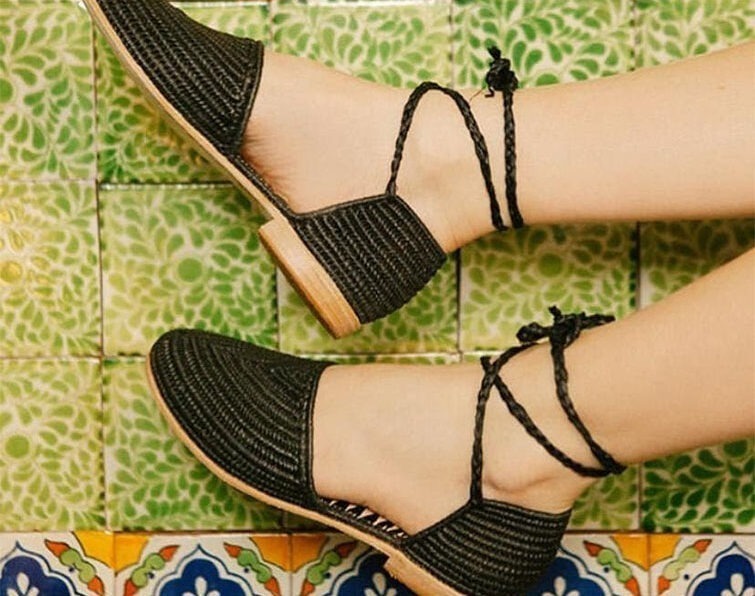 Colorful Moroccan handmade raffia shoe's representing the rich culture and heritage of Morocco.